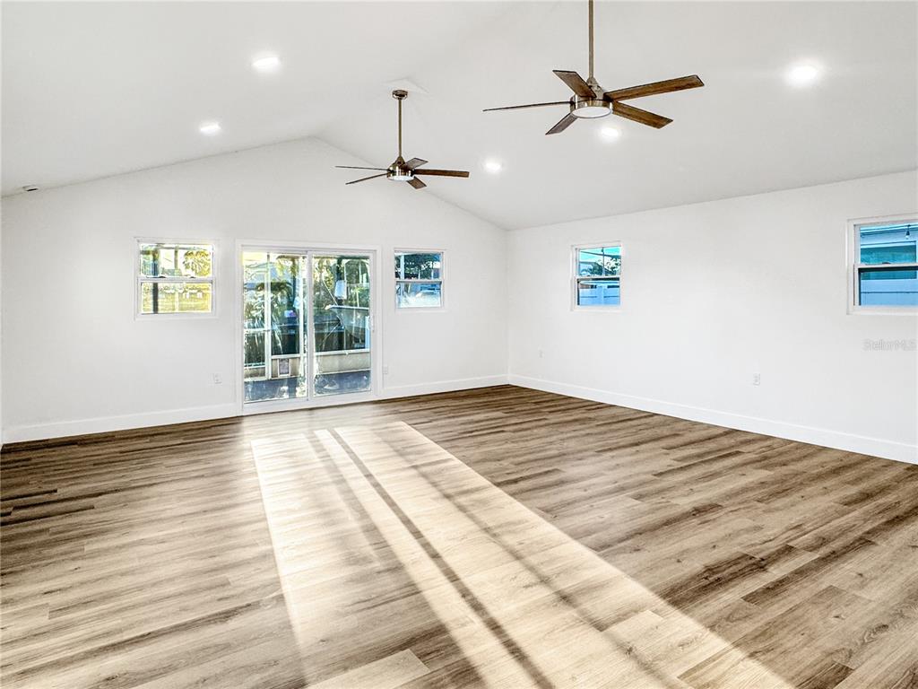 13739 Coco Avenue Hudson, FL 34667 - Photo 3 of 25 a view of an empty room with a window
