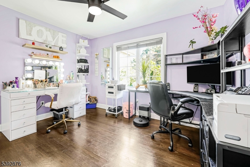 615 Prospect Avenue Fairview, NJ 07022 - Photo 12 of 18 a view of a workspace with furniture and a window