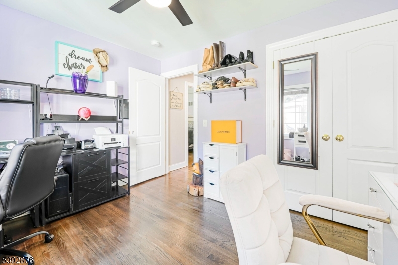 615 Prospect Avenue Fairview, NJ 07022 - Photo 13 of 18 a bedroom with a bed and furniture