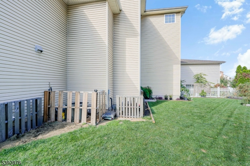615 Prospect Avenue Fairview, NJ 07022 - Photo 14 of 18 a backyard of a house with table and chairs