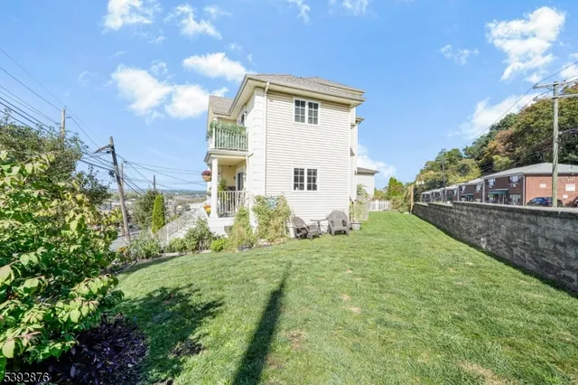a house view with garden space