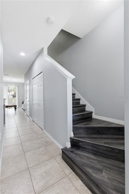4810 Poolside Drive St. Cloud, FL 34769 - Photo 13 of 26 a view of a hallway view with staircase