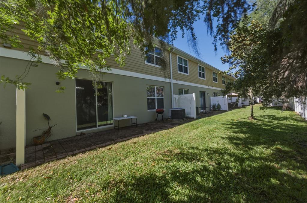 4810 Poolside Drive St. Cloud, FL 34769 - Photo 21 of 26 front view of a house with a yard