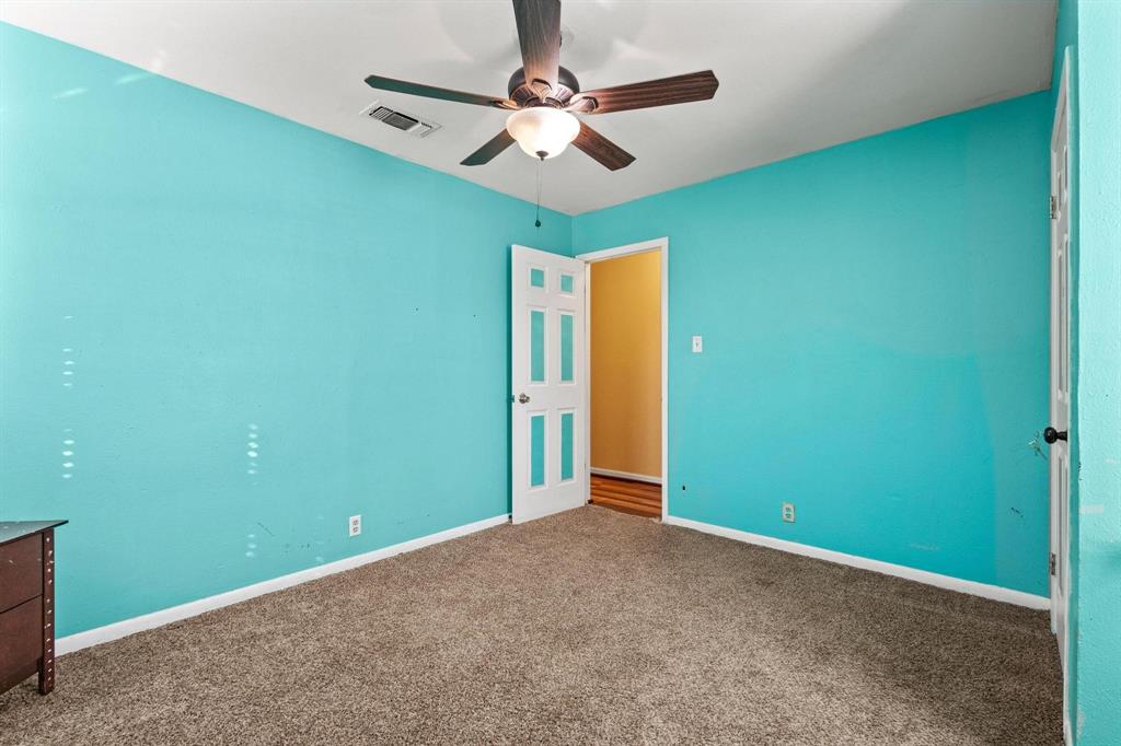 1417 Morrison Drive Denison, TX 75020 - Photo 21 of 30 Unfurnished bedroom featuring carpet and a ceiling fan
