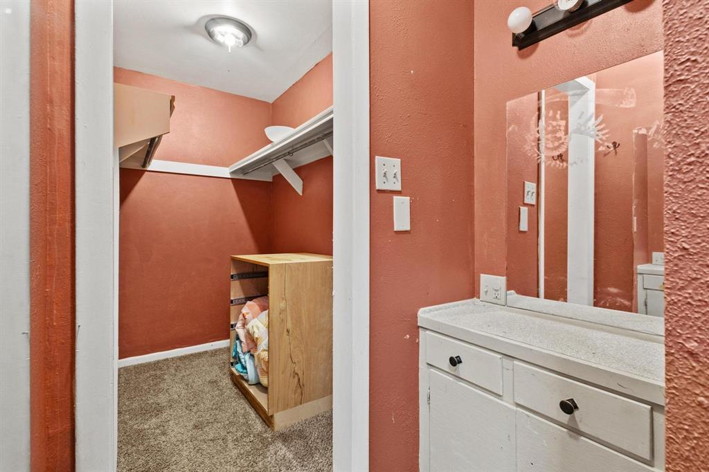 1417 Morrison Drive Denison, TX 75020 - Photo 27 of 30 Walk in closet with light colored carpet