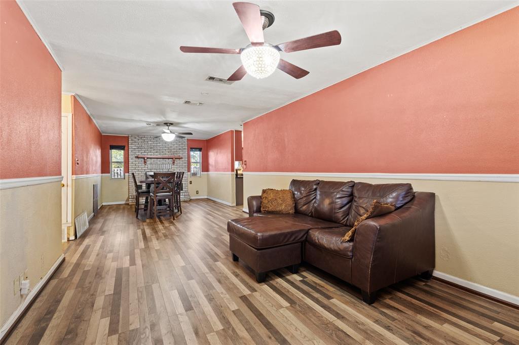 1417 Morrison Drive Denison, TX 75020 - Photo 5 of 30 Living area with wood finished floors and ceiling fan