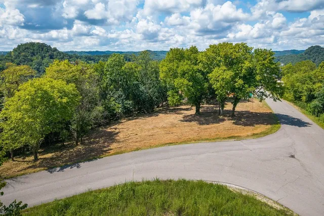 a view of a swimming pool with an outdoor space and seating area