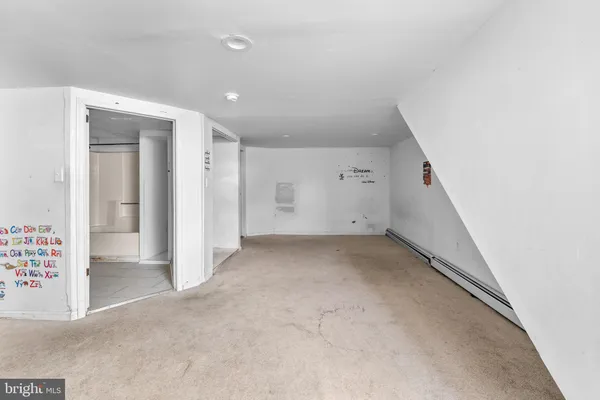 a bathroom with a sink and toilet