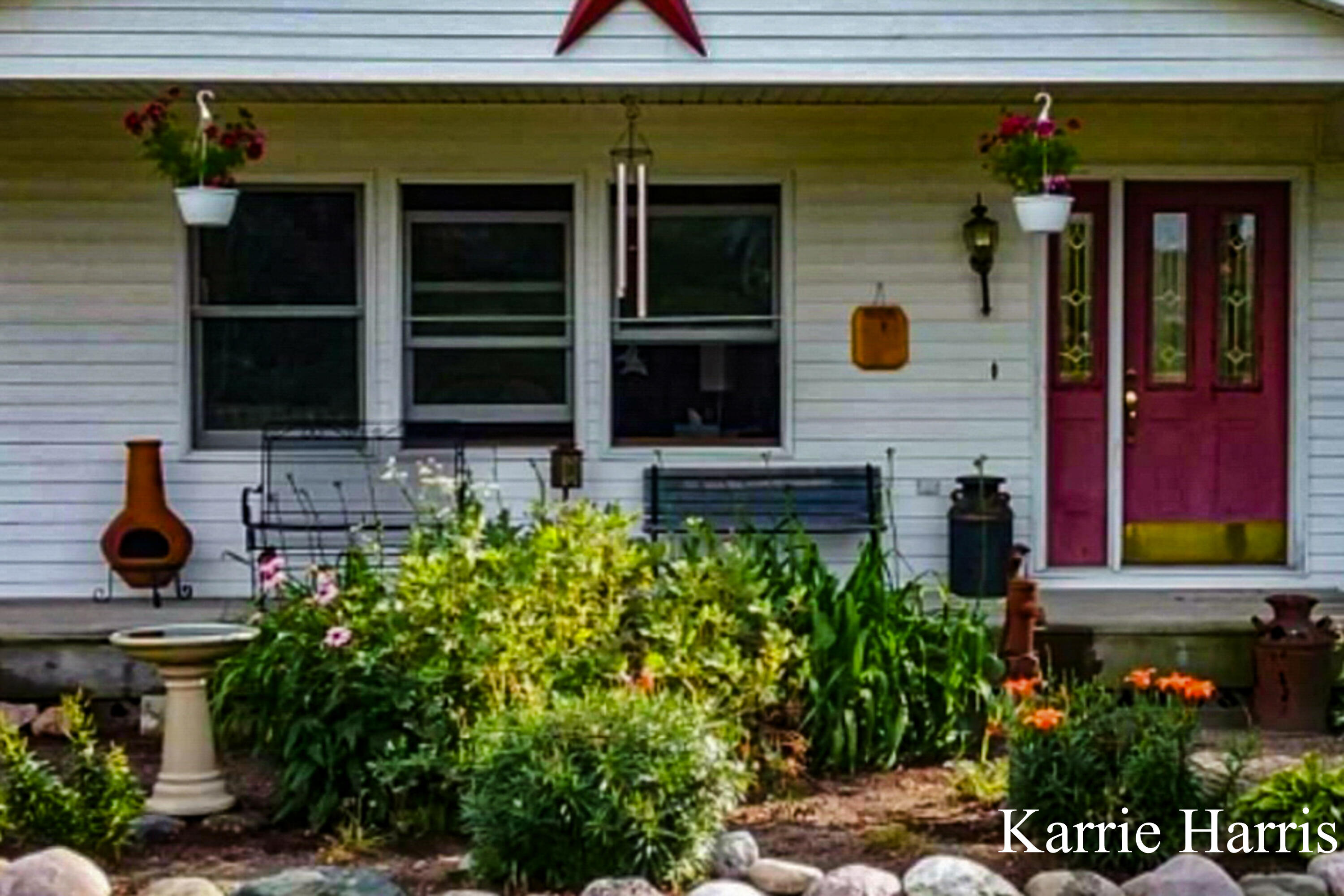 6048 Cedar Lake Road Southeast Sheridan, MI 48884 - Photo 35 of 39 Front w/ flowers