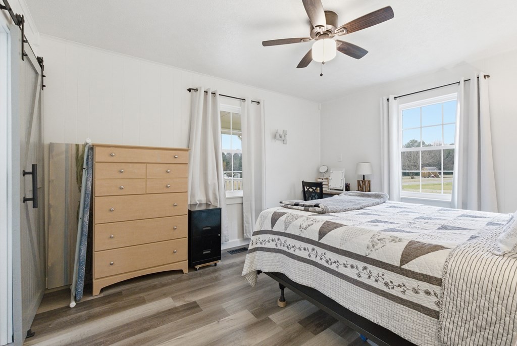 114 Viars Road Philadelphia, TN 37846 - Photo 19 of 45 a bedroom with a bed and a dresser