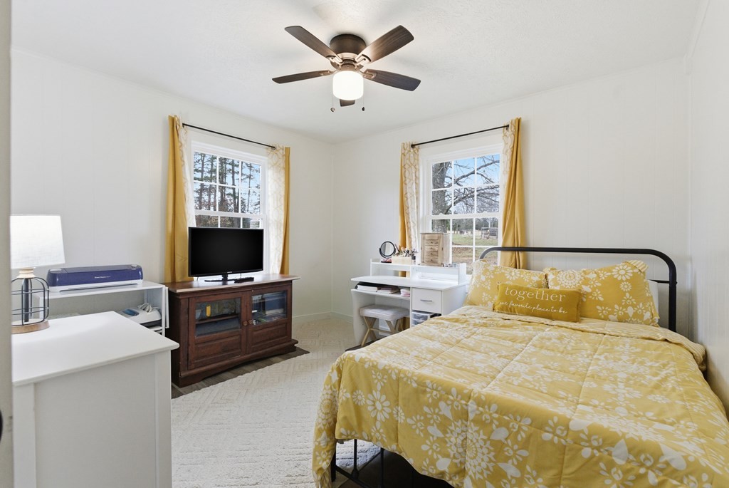 114 Viars Road Philadelphia, TN 37846 - Photo 23 of 45 a bedroom with a bed and a flat screen tv