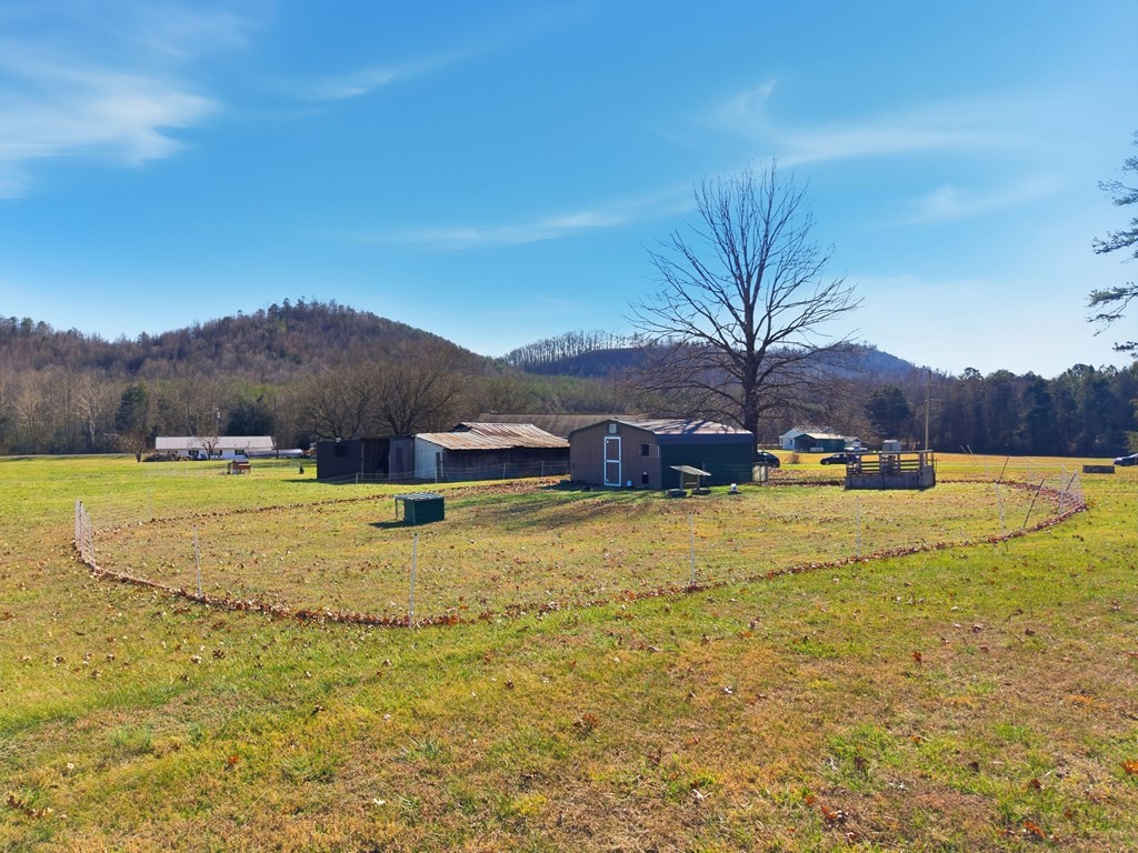 114 Viars Road Philadelphia, TN 37846 - Photo 35 of 45 a view of a lake with a mountain in the background