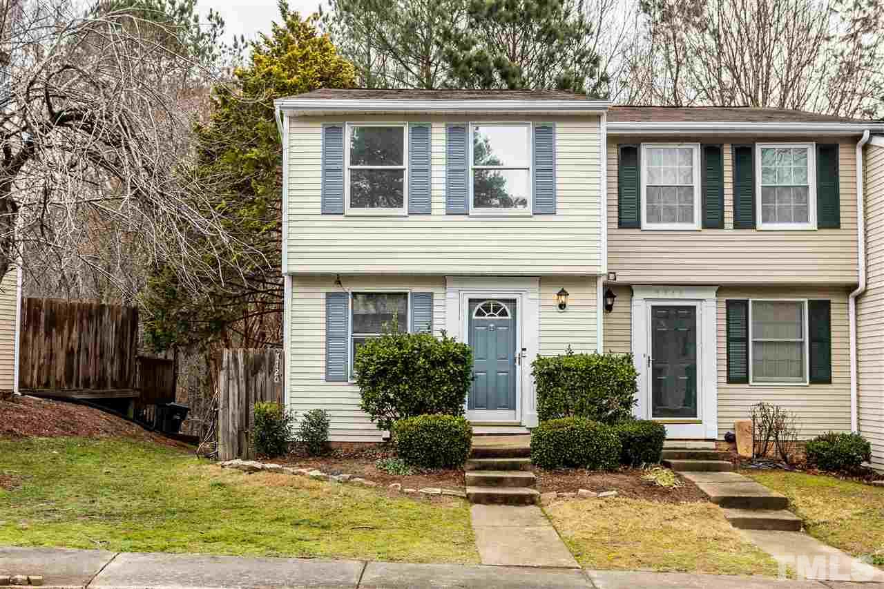 7720 Sandra Lane Raleigh, NC 27615 - Photo 1 of 25 a front view of a house with garden