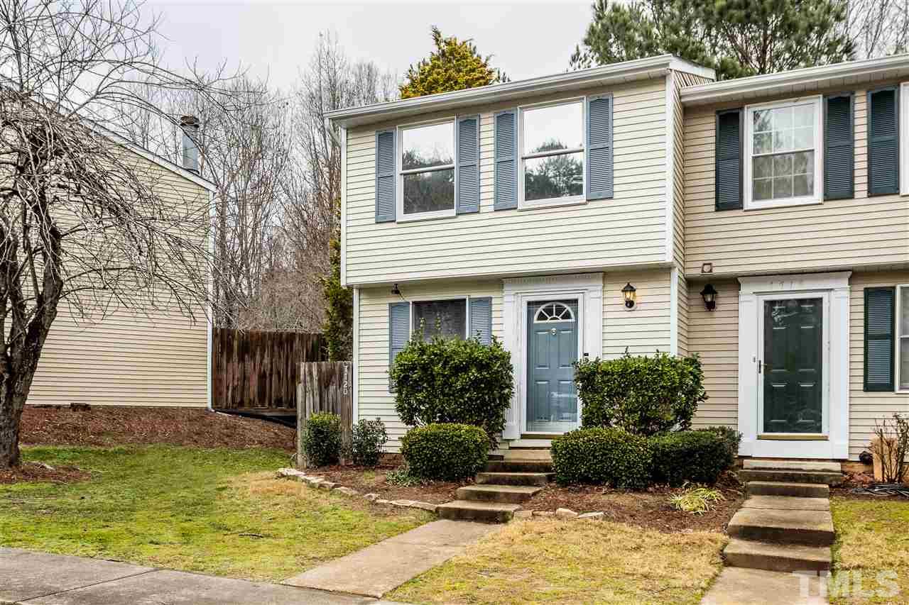 7720 Sandra Lane Raleigh, NC 27615 - Photo 2 of 25 a view of a house with a yard and plants