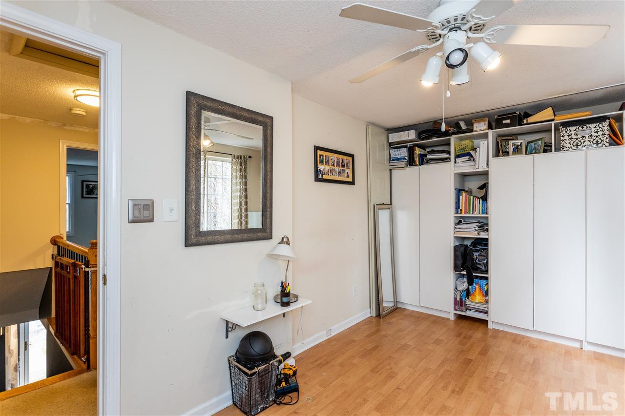7720 Sandra Lane Raleigh, NC 27615 - Photo 16 of 25 a view of an empty room with closet and a window