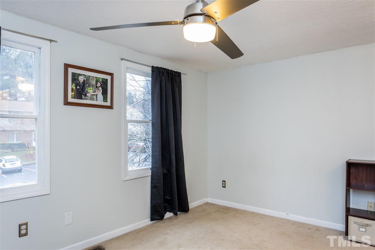 7720 Sandra Lane Raleigh, NC 27615 - Photo 17 of 25 a view of an entryway with window