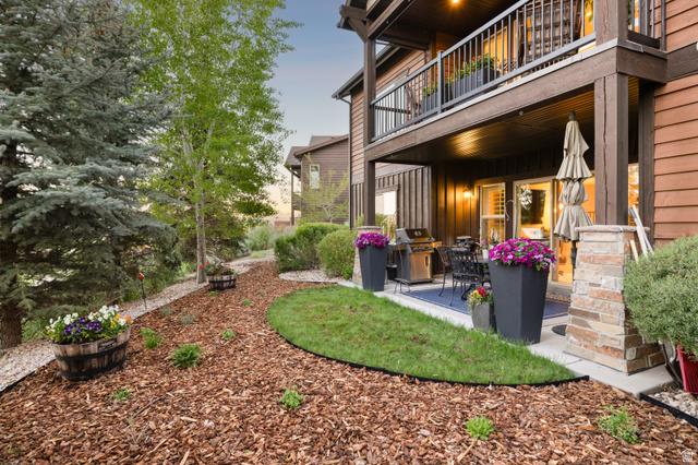 1737 East Viewside Circle Hideout, UT 84036 - Photo 27 of 35 Ground-level patio with concrete surfacing and a blue outdoor rug