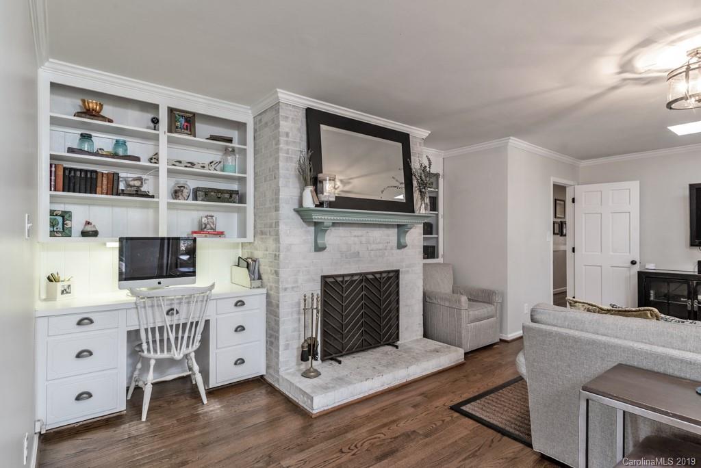 2800 High Ridge Road Charlotte, NC 28270 - Photo 16 of 34 a living room with furniture a fireplace and a flat screen tv
