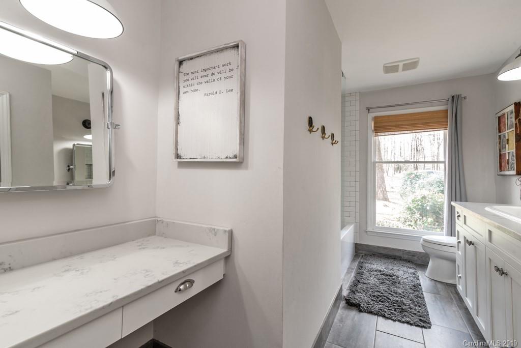 2800 High Ridge Road Charlotte, NC 28270 - Photo 19 of 34 a bathroom with a sink and a window