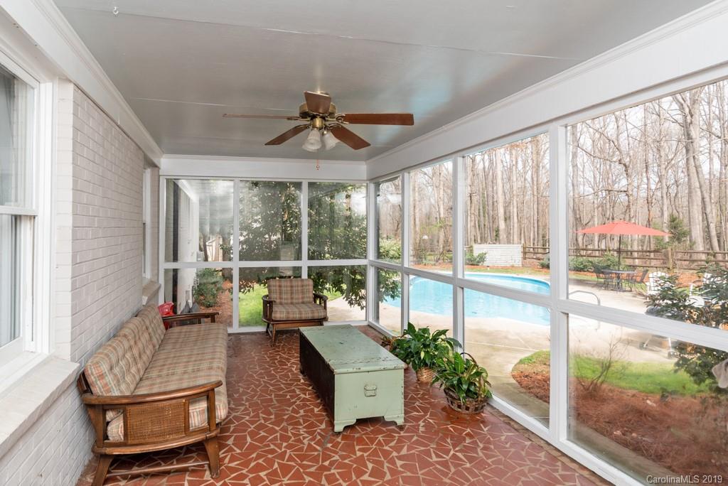 2800 High Ridge Road Charlotte, NC 28270 - Photo 27 of 34 a living room with furniture and a floor to ceiling window