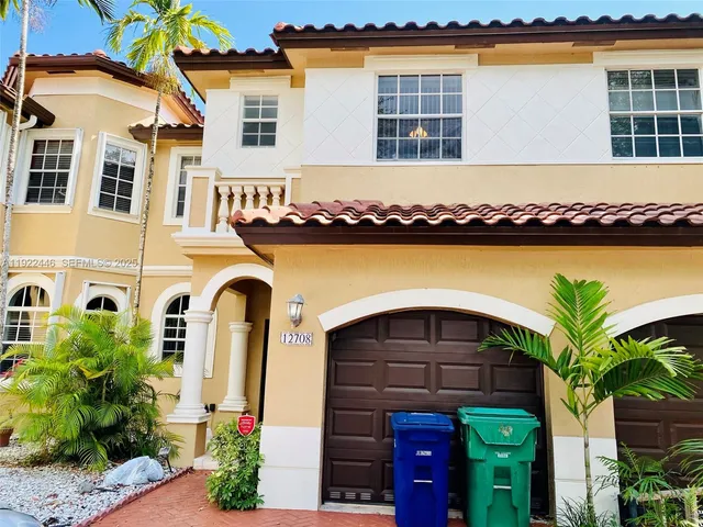 a front view of a house with balcony