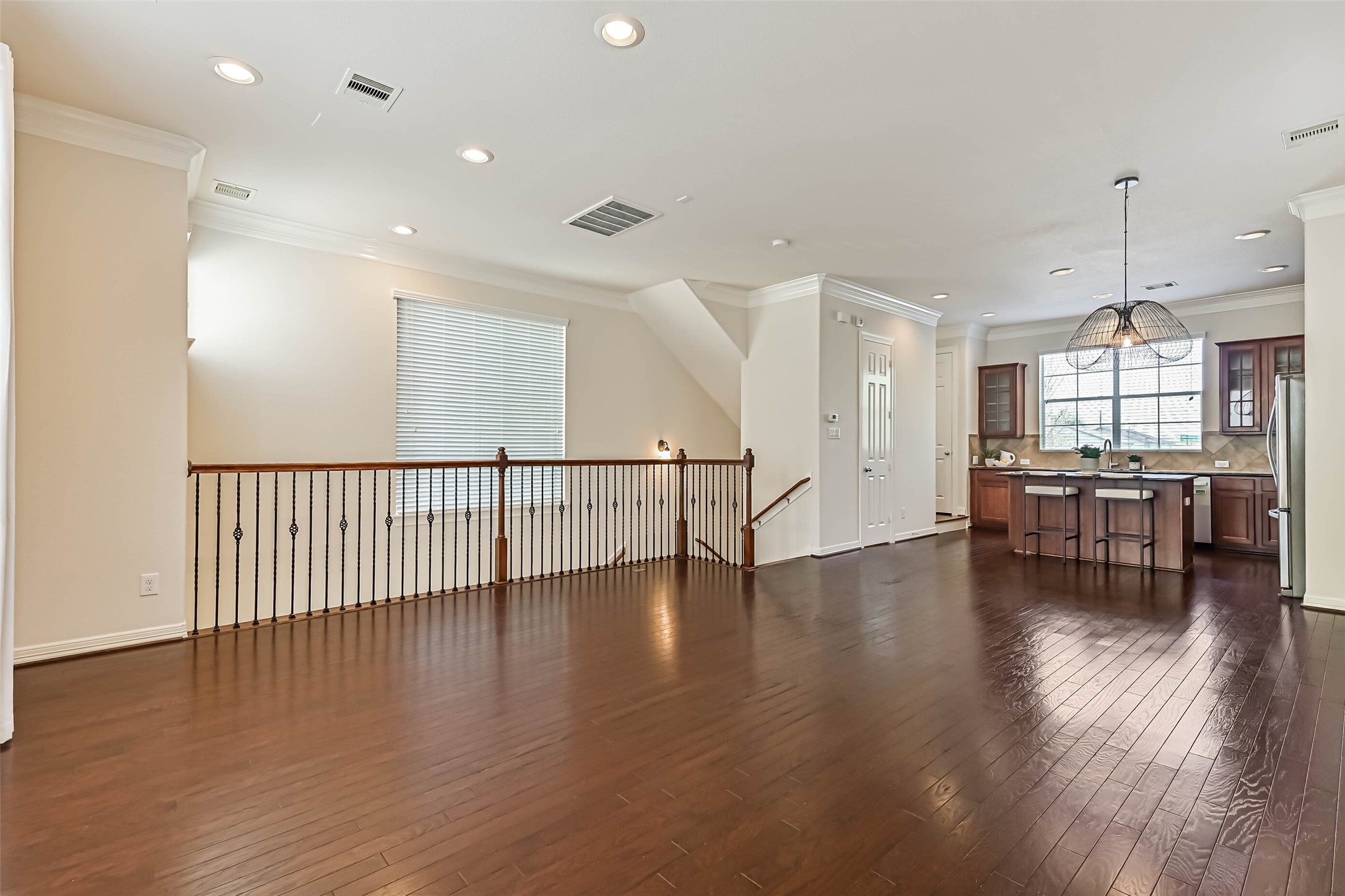 3208 Clearview Circle Houston, TX 77025 - Photo 11 of 30 Beautiful hardwood flooring flows through the entire second story. gorgeous ornate spindles