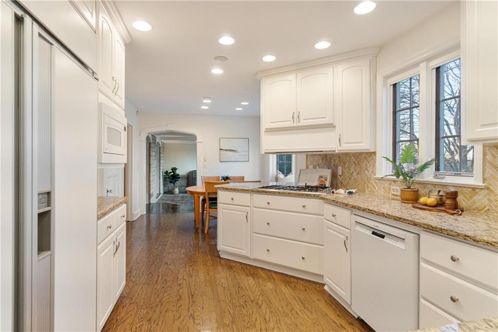 756 Osage Road Pittsburgh, PA 15243 - Photo 12 of 29 a kitchen with white cabinets and sink