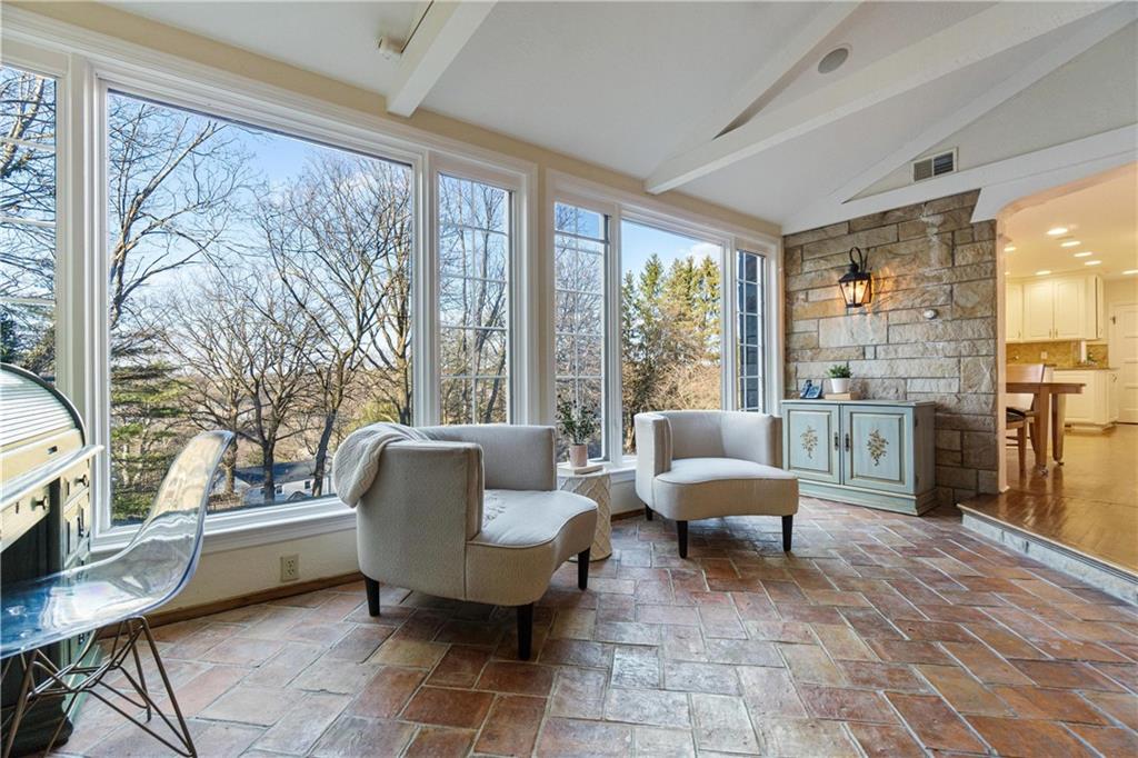 756 Osage Road Pittsburgh, PA 15243 - Photo 16 of 29 a living room with furniture and a floor to ceiling window