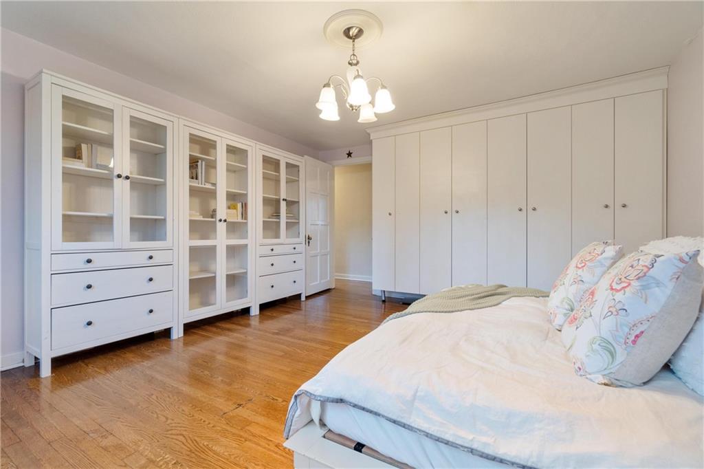 756 Osage Road Pittsburgh, PA 15243 - Photo 23 of 29 a spacious bedroom with a bed and a dresser