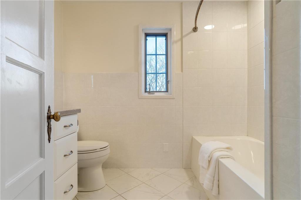 756 Osage Road Pittsburgh, PA 15243 - Photo 24 of 29 a bathroom with a toilet sink and shower