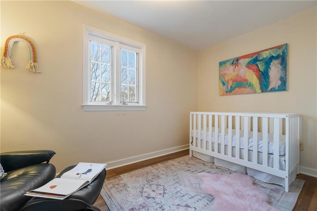 756 Osage Road Pittsburgh, PA 15243 - Photo 25 of 29 a bedroom with a bed and wooden floor