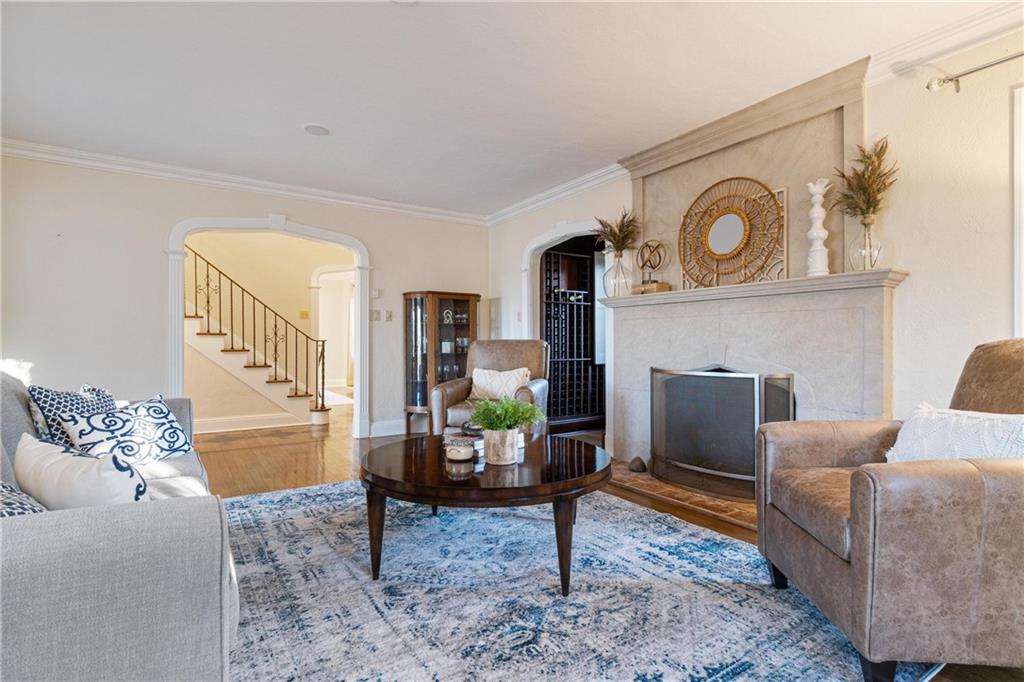 756 Osage Road Pittsburgh, PA 15243 - Photo 6 of 29 a living room with furniture and a fireplace