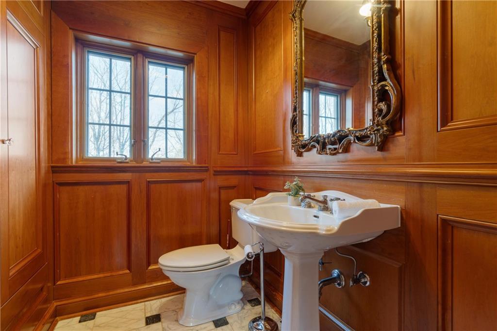 756 Osage Road Pittsburgh, PA 15243 - Photo 10 of 29 a bathroom with a sink a toilet and mirror