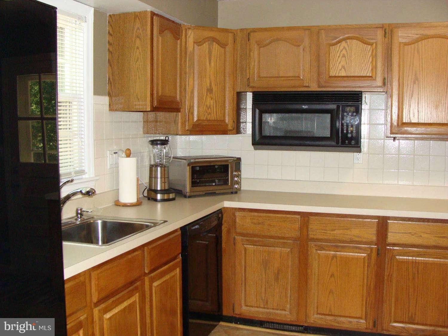 15408 Bond Mill Road Laurel, MD 20707 - Photo 12 of 30 Kitchen with Raised Panel Cabinets