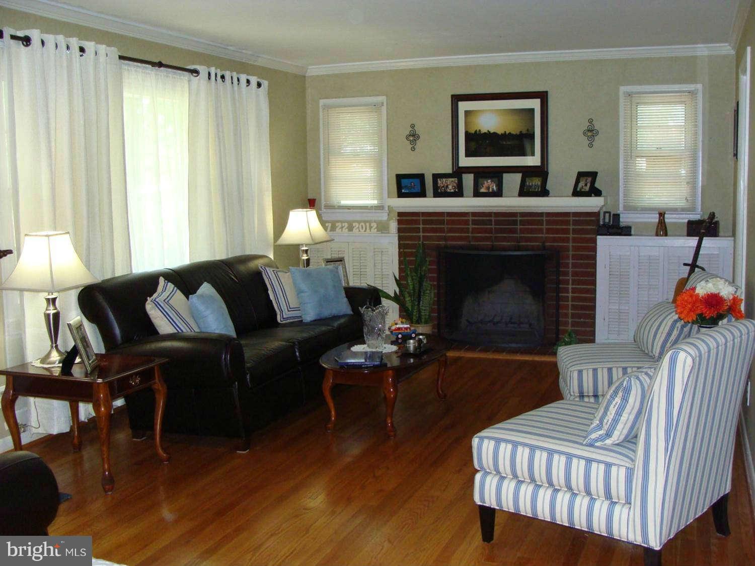 15408 Bond Mill Road Laurel, MD 20707 - Photo 3 of 30 Living Room with Fireplace