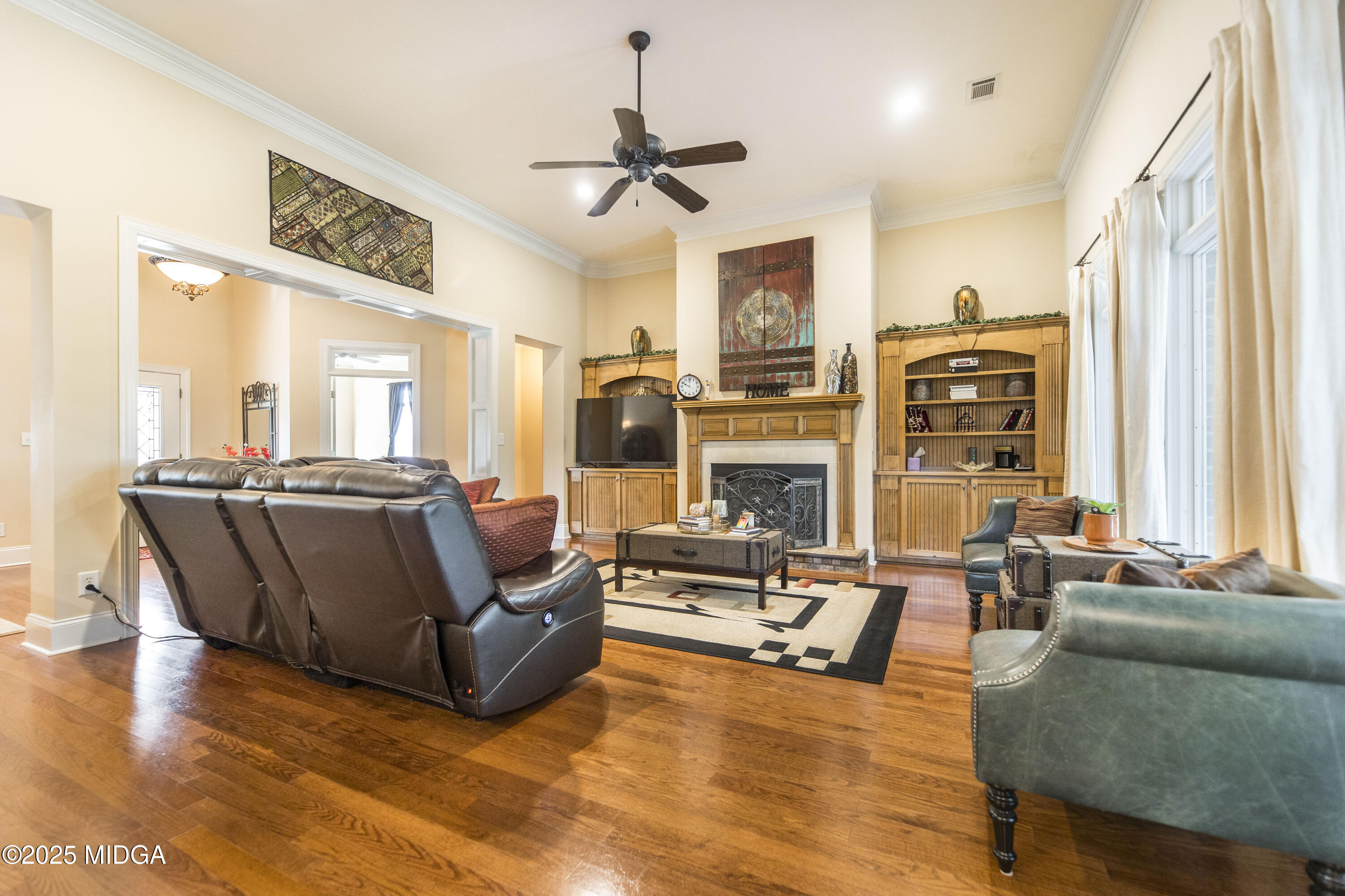 711 Latrobe Way Macon, GA 31220 - Photo 11 of 44 a living room with fireplace furniture and a large window