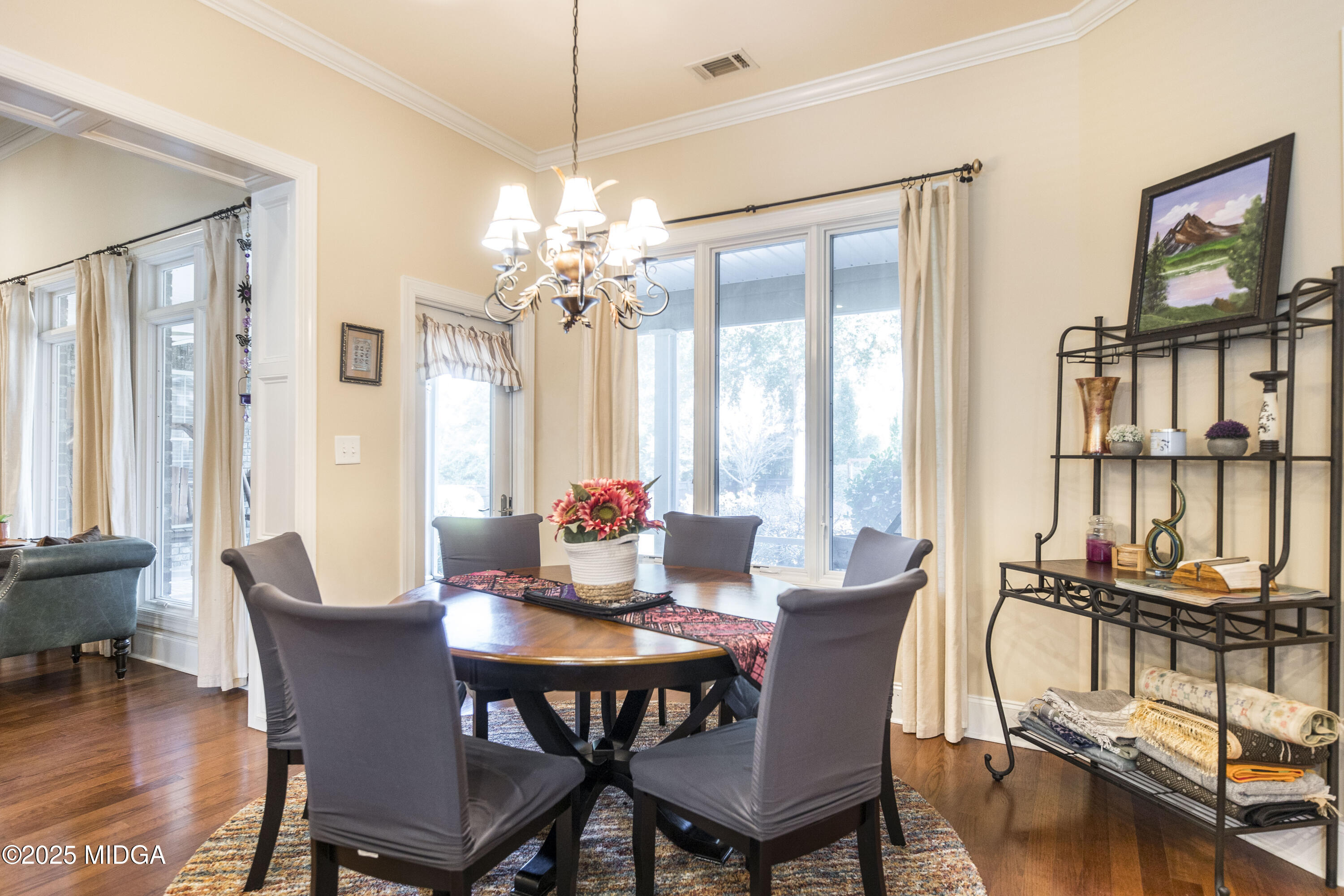 711 Latrobe Way Macon, GA 31220 - Photo 13 of 44 a view of a dining room with furniture window and wooden floor
