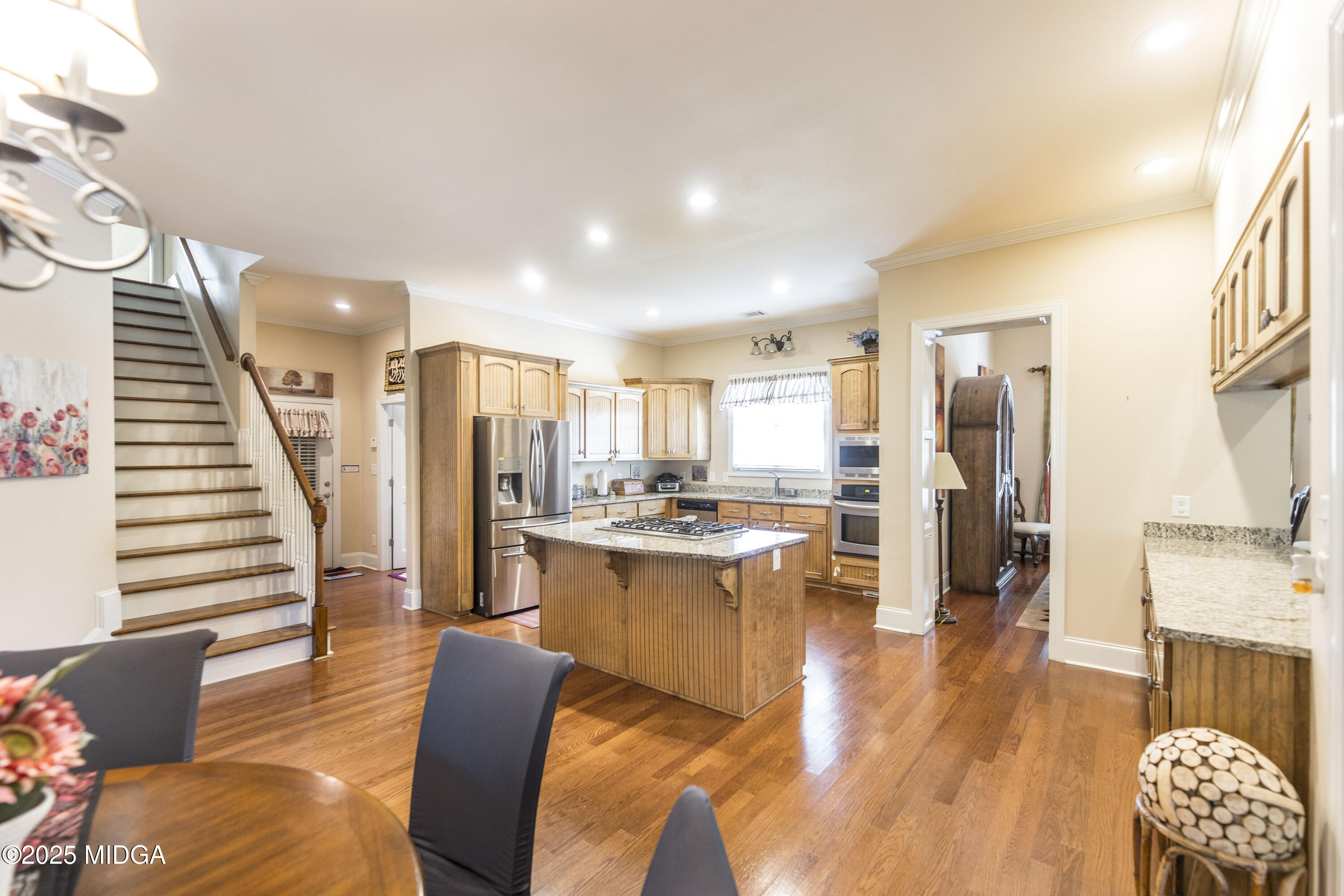 711 Latrobe Way Macon, GA 31220 - Photo 14 of 44 a living room with stainless steel appliances kitchen island granite countertop furniture and a kitchen view