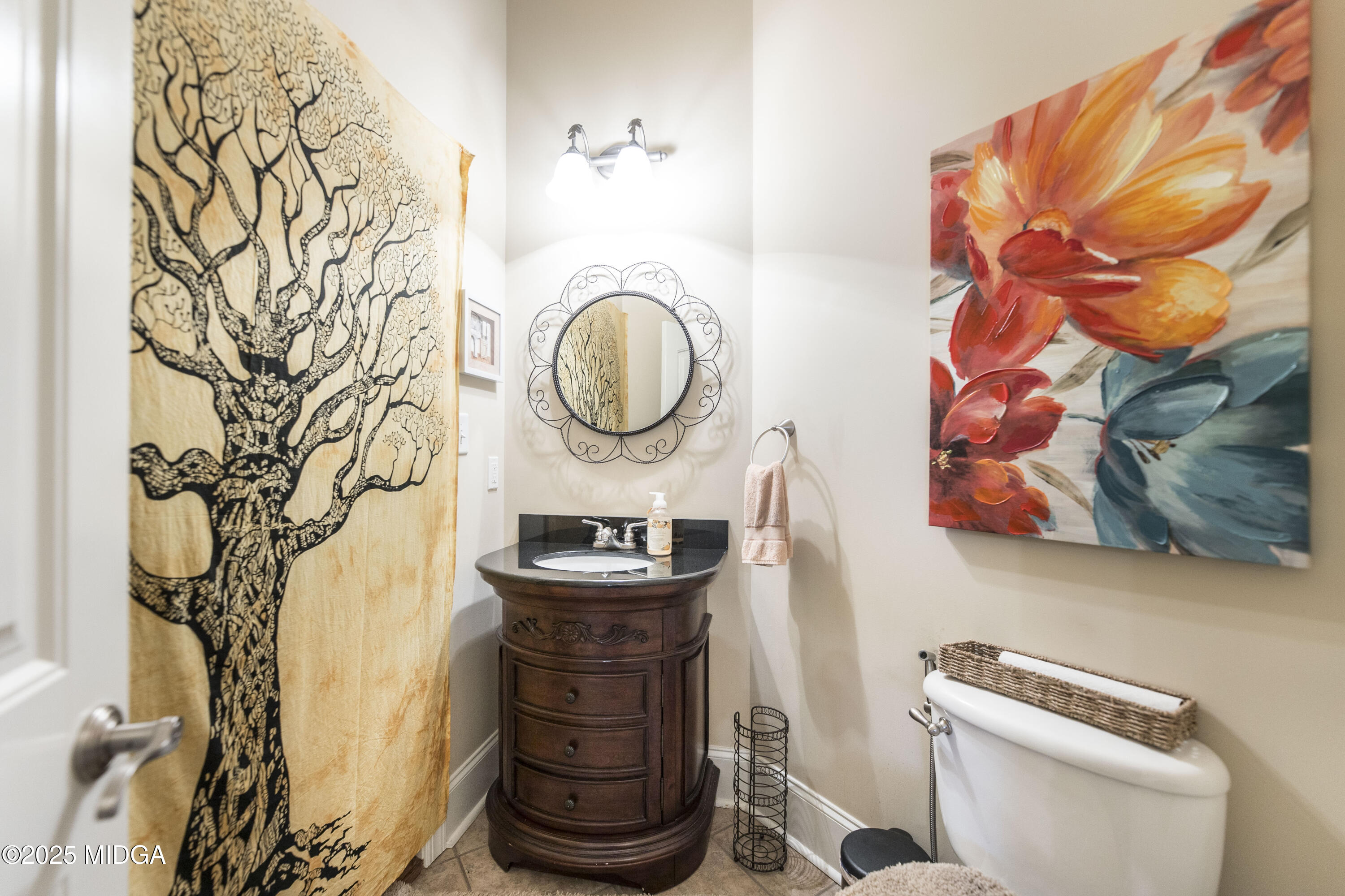 711 Latrobe Way Macon, GA 31220 - Photo 19 of 44 a bathroom with a toilet and a sink