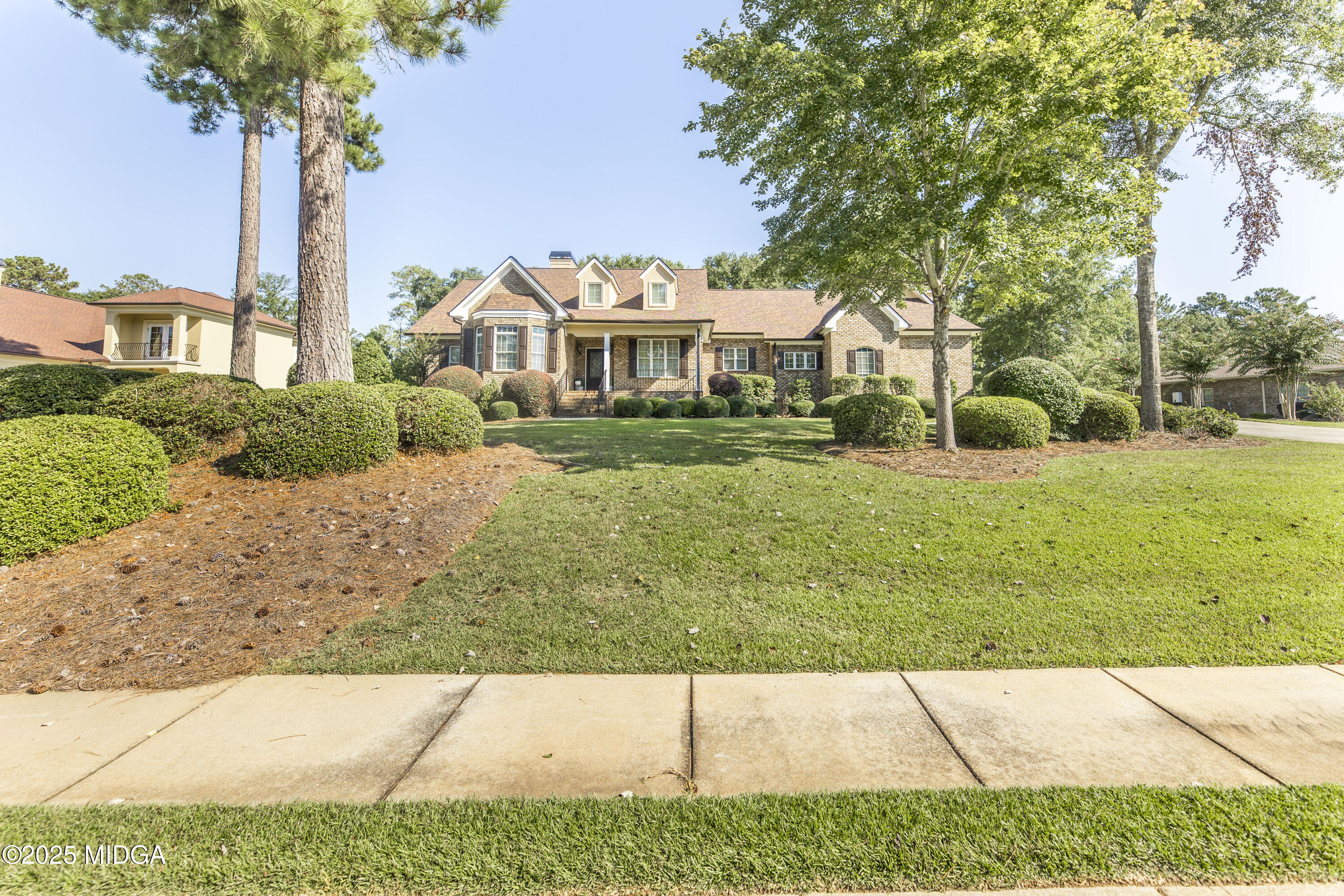 711 Latrobe Way Macon, GA 31220 - Photo 2 of 44 a view of a garden with a house