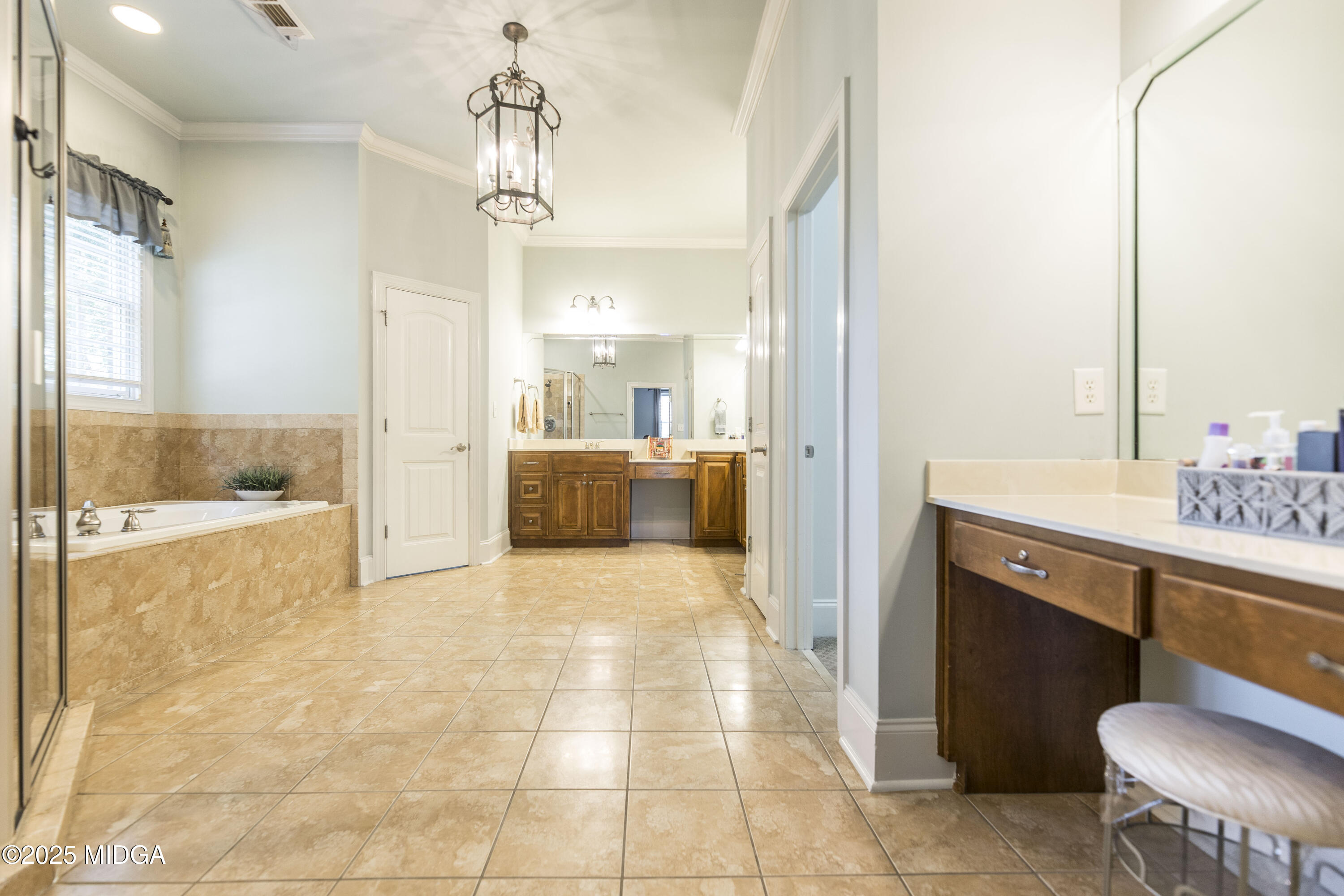 711 Latrobe Way Macon, GA 31220 - Photo 23 of 44 a bathroom with a sink a toilet and shower
