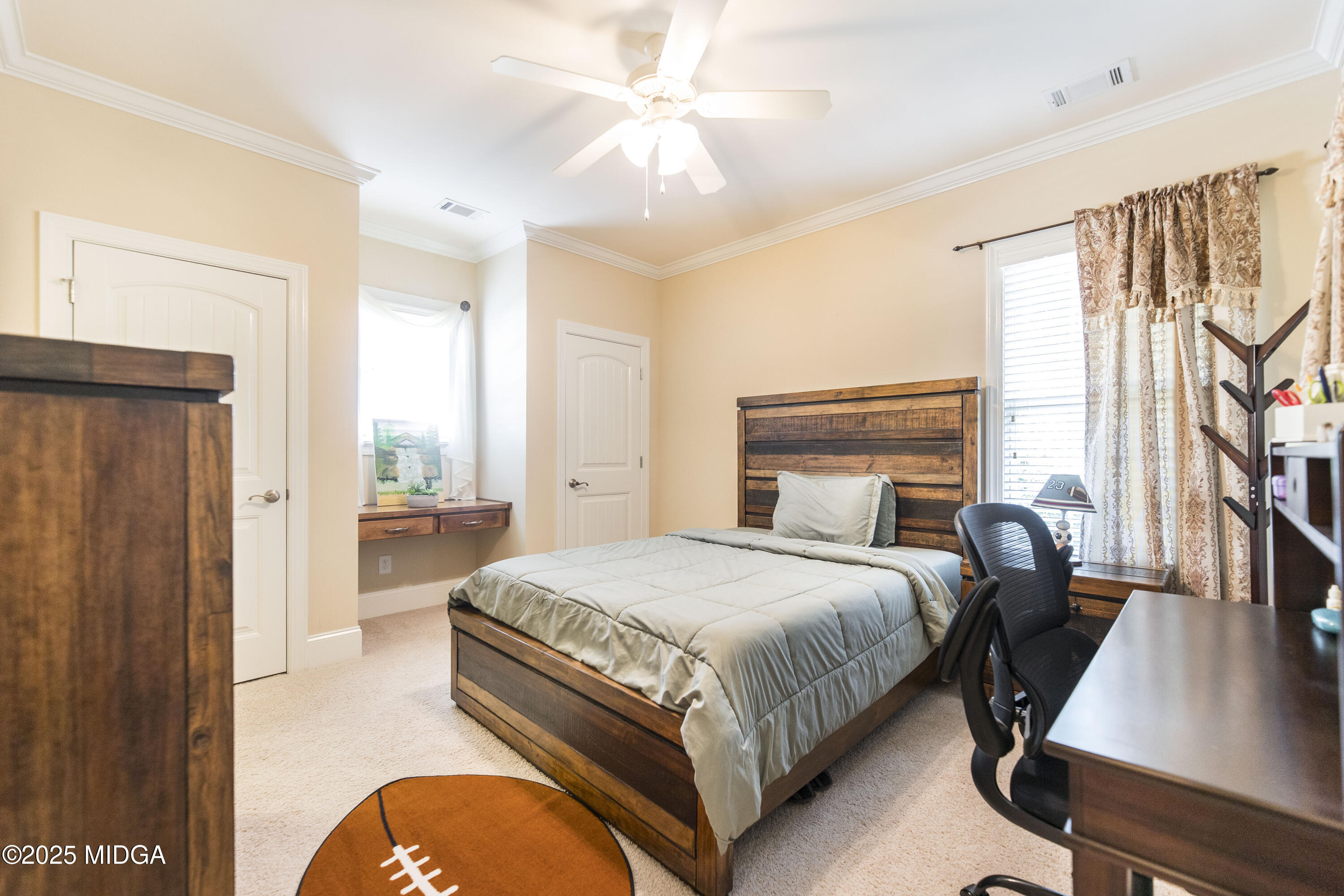 711 Latrobe Way Macon, GA 31220 - Photo 33 of 44 a bedroom with a bed window and a dresser