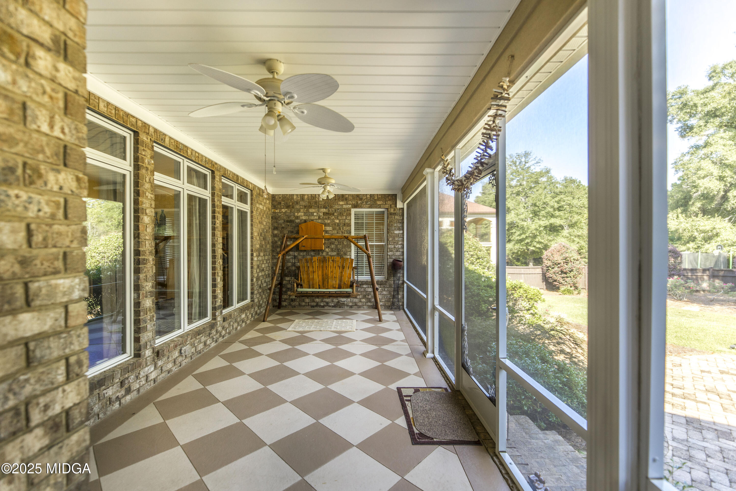 711 Latrobe Way Macon, GA 31220 - Photo 38 of 44 a view of a porch with a table and chairs