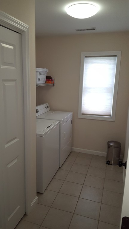 4 Mary Street Springfield, MA 01118 - Photo 11 of 16 a utility room with dryer and washer
