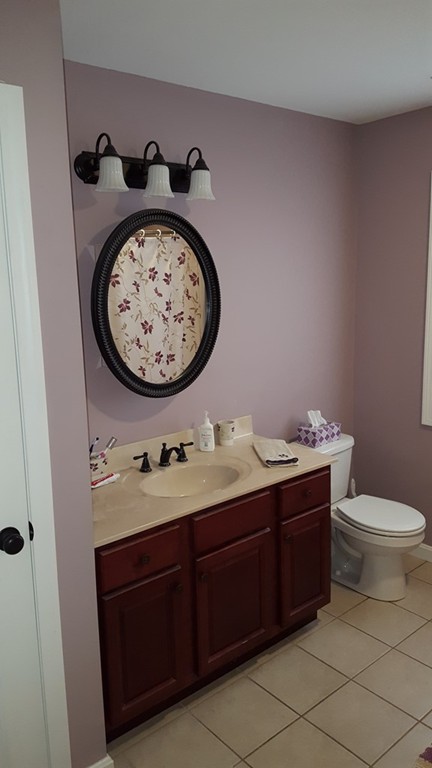 4 Mary Street Springfield, MA 01118 - Photo 12 of 16 a bathroom with a toilet and a sink