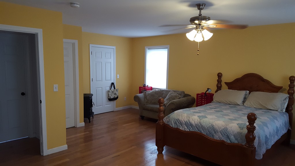 4 Mary Street Springfield, MA 01118 - Photo 13 of 16 a bedroom with bed and window
