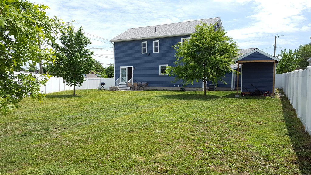 4 Mary Street Springfield, MA 01118 - Photo 2 of 16 a view of a house with a yard