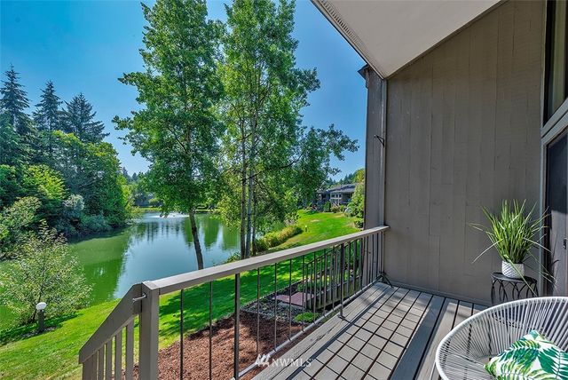 a view of a balcony with lake view