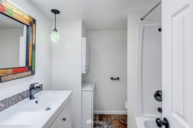 a front view of a house with a yard and porch