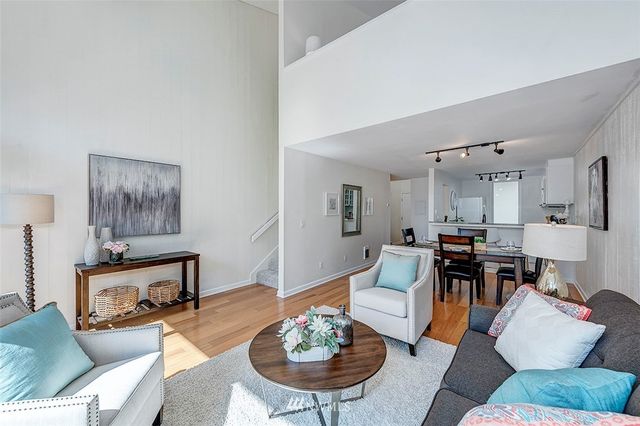 a bedroom with a bed and a chair